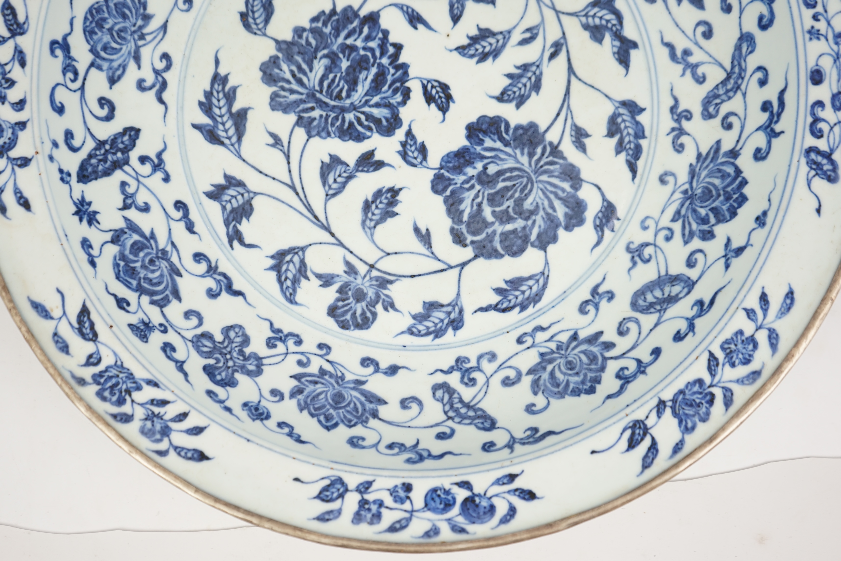 A large Chinese Ming style blue and white dish, possibly 18th century